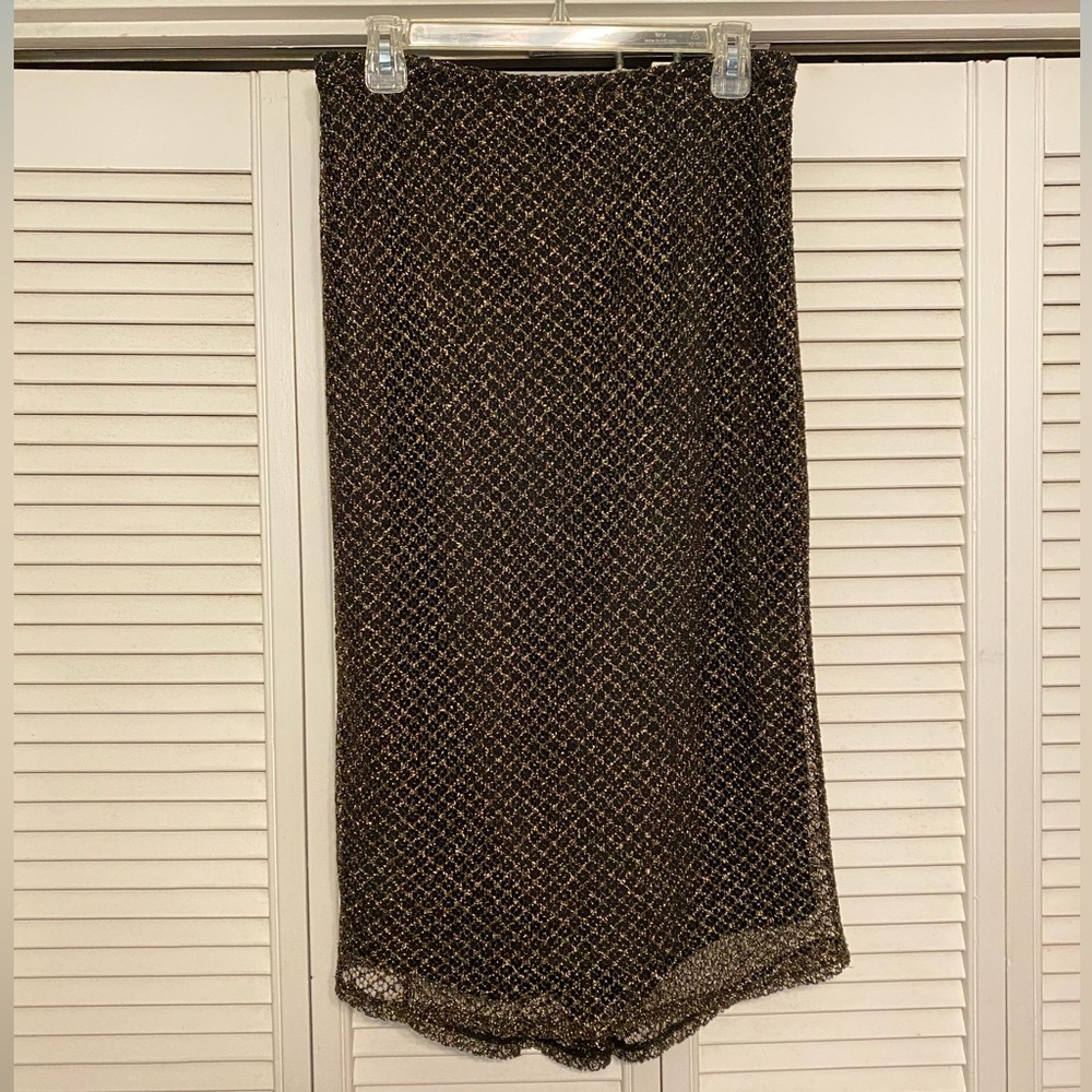Express skirt, medium, midi length, black with gold metallic overlay.